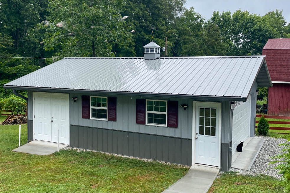 gray shed with metal roof cupola
